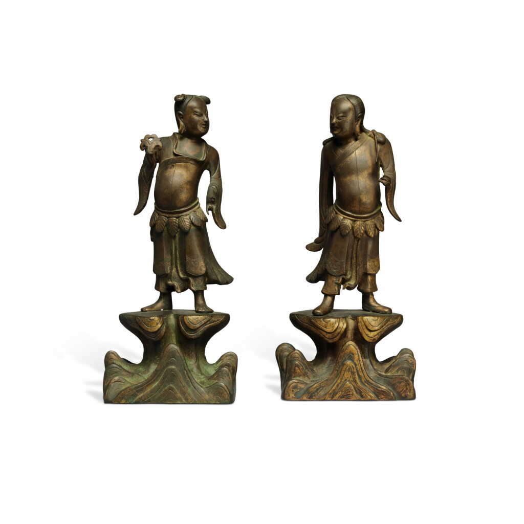 View full screen - View 1 of Lot 121. A pair of parcel gilt-bronze figures of immortals, 17th century.