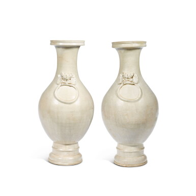 View full screen - View 1 of Lot 80. A rare and important pair of cream-glazed vases, Yuan dynasty.