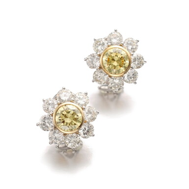 View full screen - View 1 of Lot 713. Pair of Fancy Intense Yellow diamond ear clips.