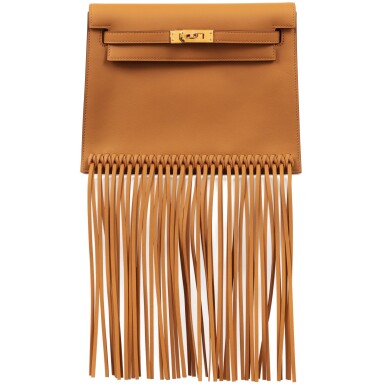 View full screen - View 1 of Lot 325. Limited Edition Sésame Swift Fringe Kelly Danse II Anate Gold Hardware, 2023.