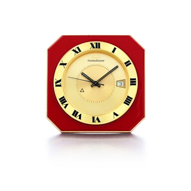 View full screen - View 1 of Lot 18. Reference 11174.71 Brass and enamel travel clock with alarm and date Circa 1970.