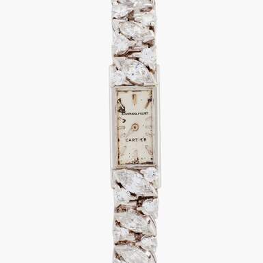 View full screen - View 1 of Lot 494. Retailed by Cartier: A platinum and diamond-set wristwatch, Circa 1966.