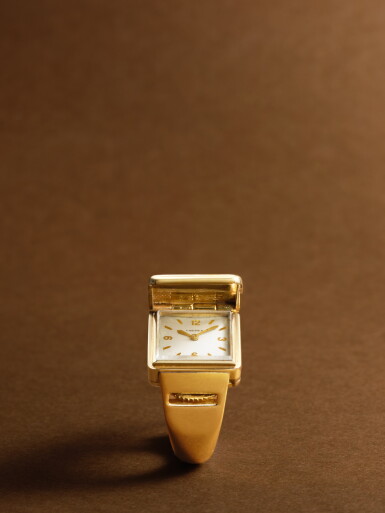 View full screen - View 1 of Lot 2155. New York retailed | A yellow gold ring watch with concealed dial, Circa 1937.
