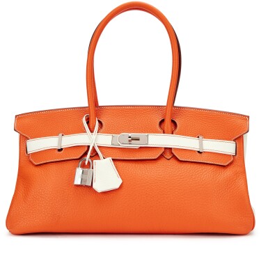 View full screen - View 1 of Lot 5568. Orange H and White Clemence HSS JPG Shoulder Birkin 42 Palladium Hardware, 2009.