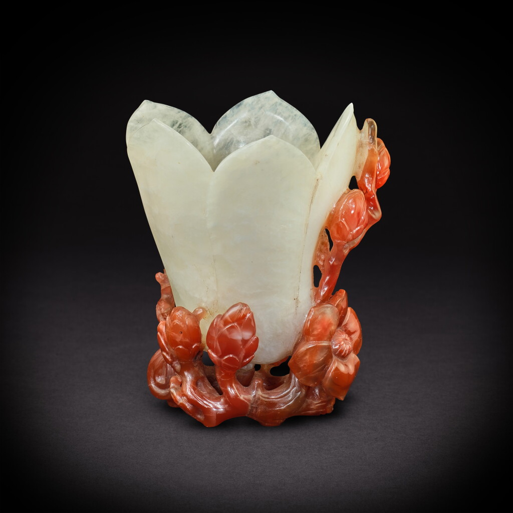 View full screen - View 1 of Lot 3564. A carnelian agate 'magnolia' libation cup, Qing dynasty, 18th - 19th century | 清十八至十九世紀 南紅瑪瑙巧雕玉蘭盃.