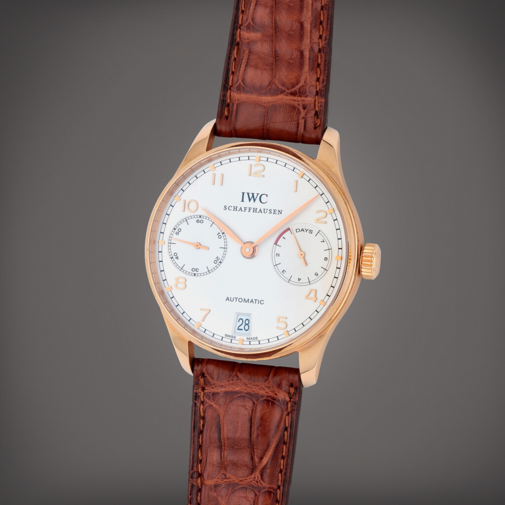 View full screen - View 1 of Lot 424. Portugieser 7 Day, Reference 500101 | A pink gold wristwatch with date and power reserve indication | Circa 2004.