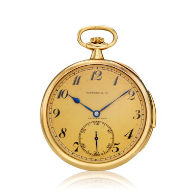 View full screen - View 1 of Lot 112. Retailed by Tiffany & Co.: A yellow gold open faced minute repeating watch with gilt dial, Made in 1919 .