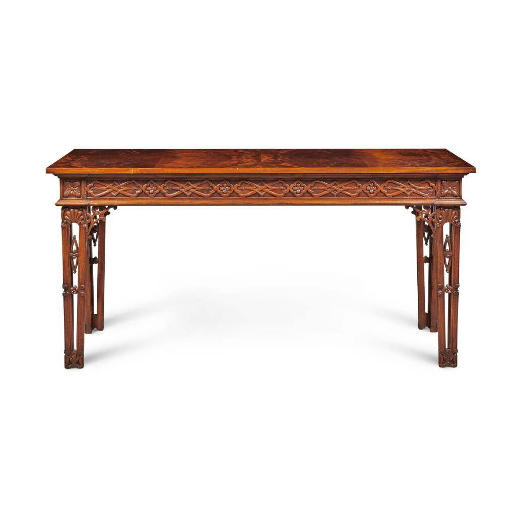 View full screen - View 1 of Lot 10. A George III Style Mahogany Side Table after designs by Thomas Chippendale.