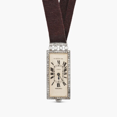 View full screen - View 1 of Lot 2459. A platinum and diamond-set pendant watch, Circa 1913.