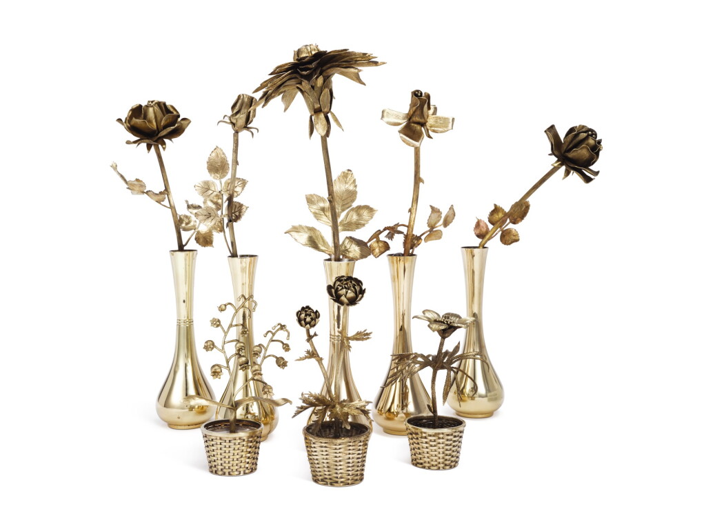 View full screen - View 1 of Lot 404. A GROUP OF EIGHT SILVER-GILT FLOWERS, TIFFANY & CO., NEW YORK, 20TH CENTURY.