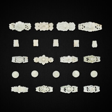 View full screen - View 1 of Lot 3049. A group of twenty two pale celadon jade buttons, Ming - Qing dynasty 明至清 青白玉花扣一組二十二件.