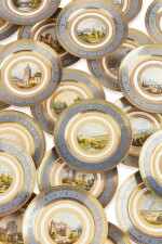 Vingt-quatre assiettes en porcelaine de Sèvres, à fond bleu agate du service des "Petites vues de France", vers 1858