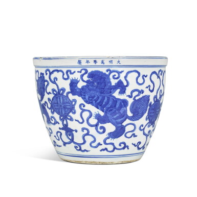 View full screen - View 1 of Lot 217. A blue and white ‘Buddhist lion’ jardinière, Mark and period of Wanli | 明萬曆 青花佛獅戲球大缸《大明萬曆年製》款.