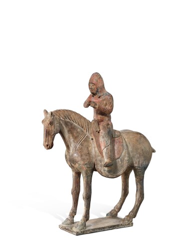 View full screen - View 1 of Lot 5128. A large painted pottery figure of an equestrian, Tang dynasty | 唐 陶加彩騎馬俑.