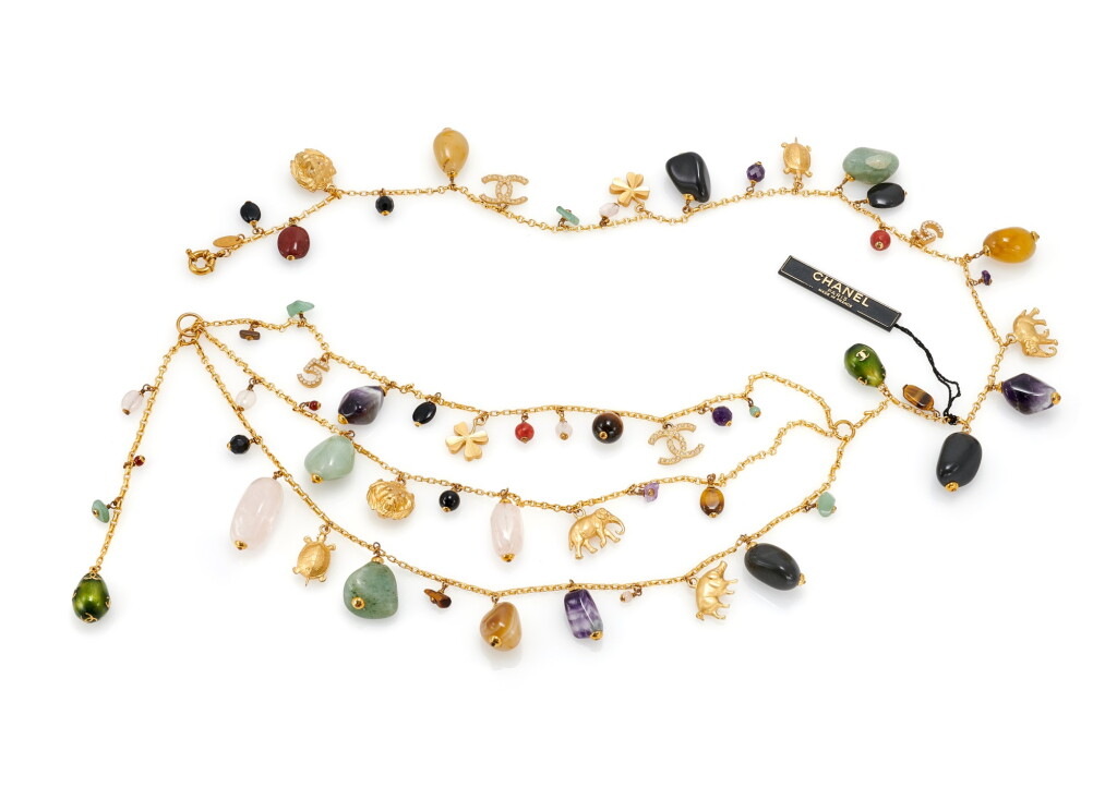 View full screen - View 1 of Lot 121. CHANEL | HARDSTONE AND GOLD-TONE METAL CHARM BELT .