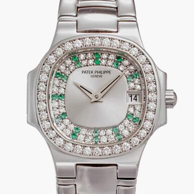 View full screen - View 1 of Lot 147. Reference 4700/153 Nautilus | A white gold, emerald, and diamond-set wristwatch with date and bracelet, Made in 2001.