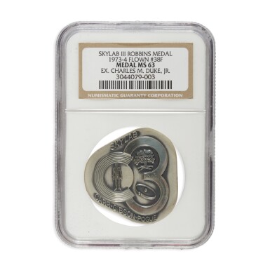 View full screen - View 1 of Lot 216. FLOWN ON SKYLAB III (SL-4). APOLLO ASTRONAUT CHARLES DUKE'S SKYLAB III ROBBINS MEDALLION.