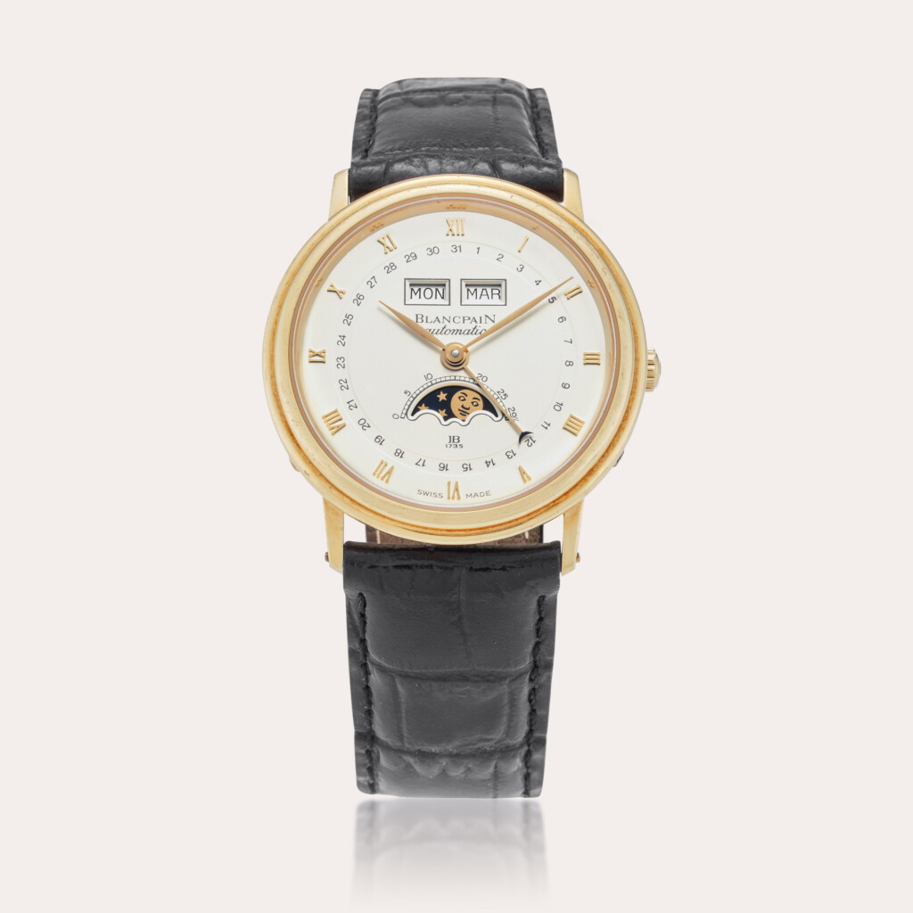 View full screen - View 1 of Lot 355. Villeret | A yellow gold automatic triple calendar wristwatch with moon phases, Circa 1995 .