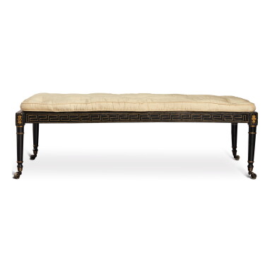 View full screen - View 1 of Lot 911. A REGENCY BLACK & GOLD JAPANNED CANED BENCH WITH CUSHION AND ON CASTORS, EARLY 19TH CENTURY.