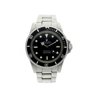 View full screen - View 1 of Lot 65. REFERENCE 5513 SUBMARINER RETAILED BY TIFFANY & CO.: A STAINLESS STEEL AUTOMATIC WRISTWATCH WITH BRACELET, CIRCA 1987.