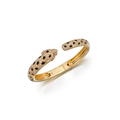 View full screen - View 1 of Lot 240. Gold, Emerald, Onyx and Diamond 'Panthère de Cartier' Bangle-Bracelet, France.