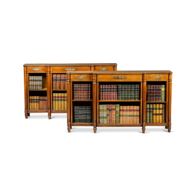 View full screen - View 1 of Lot 83. A pair of Regency rosewood breakfront open bookcases, circa 1820.