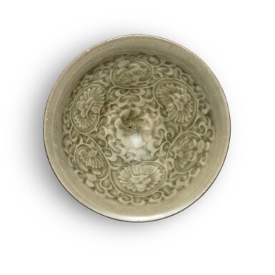 View full screen - View 1 of Lot 163. A ‘Yaozhou' celadon-glazed 'floral’ bowl, Northern Song dynasty | 北宋 耀州窰青釉纏枝花卉紋盌.