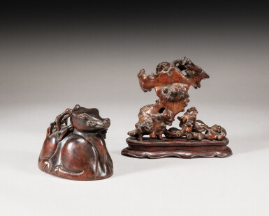View full screen - View 1 of Lot 47. A 'deer and lingzhi' libation cup and a 'scholar's rock-imitation' burlwood sculpture, Qing dynasty | 清 硬木鹿銜芝角盃 及 木根仿石供 一組兩件.