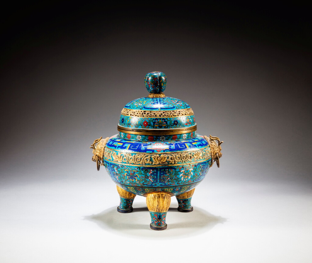 View full screen - View 1 of Lot 115. A gilt-bronze and cloisonné enamel incense burner and cover, Qing dynasty, 19th century | 清十九世紀 掐絲琺瑯纏枝蓮紋朝冠耳三足爐配蓋.
