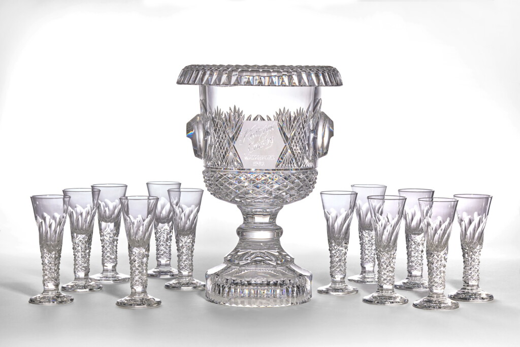 View full screen - View 1 of Lot 132. A Waterford Crystal Cut and Etched Champagne Cooler or Vase and Twelve Wine Glasses, Dated 1982.