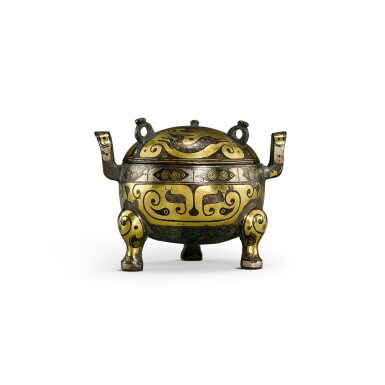 View full screen - View 1 of Lot 542. A small gold and silver-inlaid bronze 'deer' ritual food vessel, ding, Western Han dynasty 西漢 銅錯金銀鹿紋小鼎.