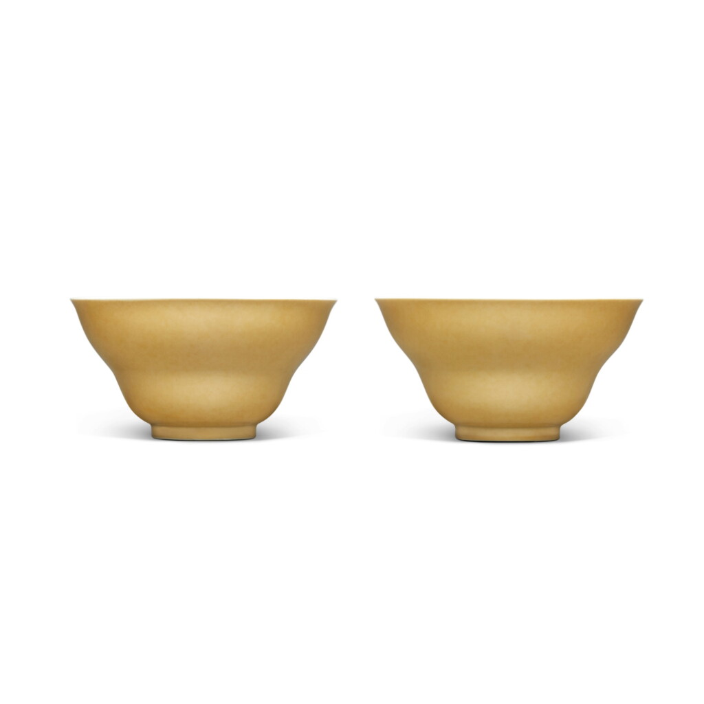 View full screen - View 1 of Lot 508. A pair of café-au-lait-glazed ogee-form bowls, Seal marks and period of Qianlong | 清乾隆 米黃釉折腰盌一對 《大清乾隆年製》款.