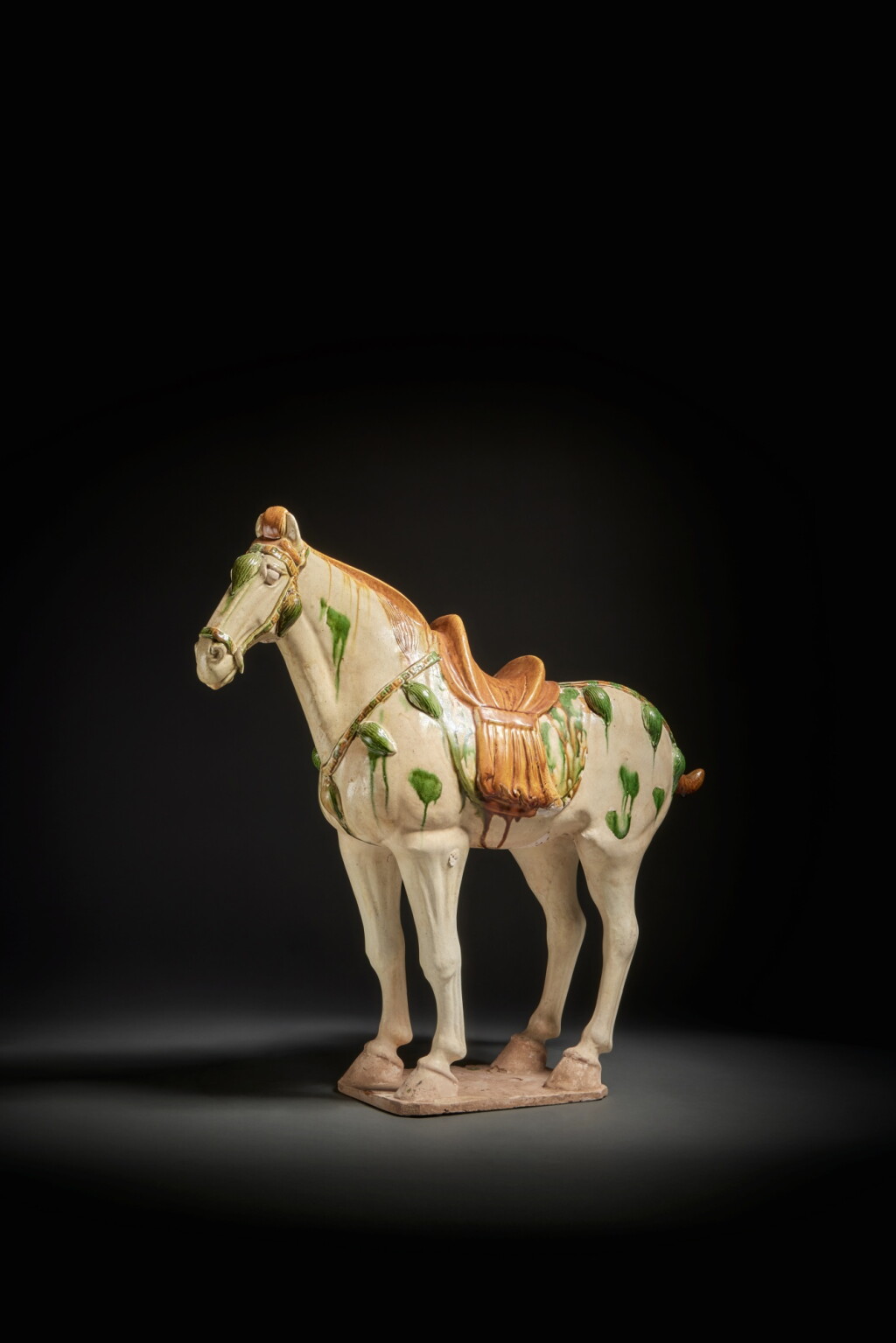View full screen - View 1 of Lot 184. A sancai-glazed pottery figure of a horse, Tang dynasty.