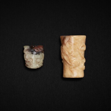 View full screen - View 1 of Lot 530. A white jade 'chilong' tube and a celadon jade 'tiger' bead, Shang - early Western Zhou dynasty | 商至西周早期 白玉螭龍玉管及青玉虎頭珮.