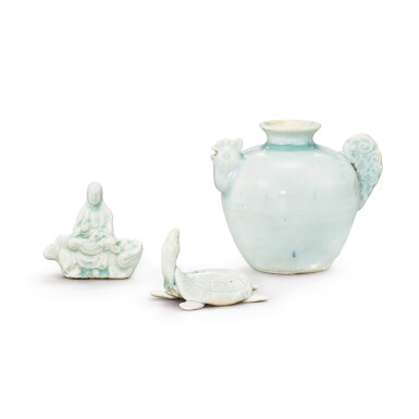 View full screen - View 1 of Lot 371. A Qingbai 'chicken-head' water dropper, a tortoise-form stand, and a 'Guanyin and makara' water dropper, Song dynasty 宋 青白釉雞首水注、龜形筆擱 及 南海觀音騎鰲水注 一組三件.