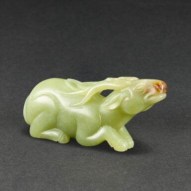 View full screen - View 1 of Lot 545. A YELLOWISH-CELADON JADE FIGURE OF A DEER SONG DYNASTY OR LATER | 宋或更晚 青白玉雕臥鹿.