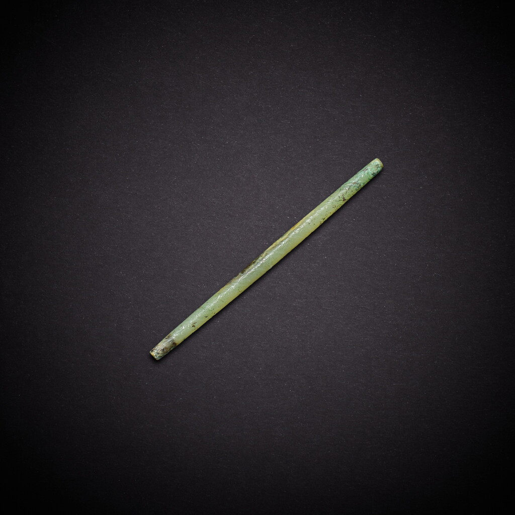 View full screen - View 1 of Lot 3498. A pale celadon jade 'dragon' tube, Western Zhou dynasty | 西周 青白玉龍紋管.