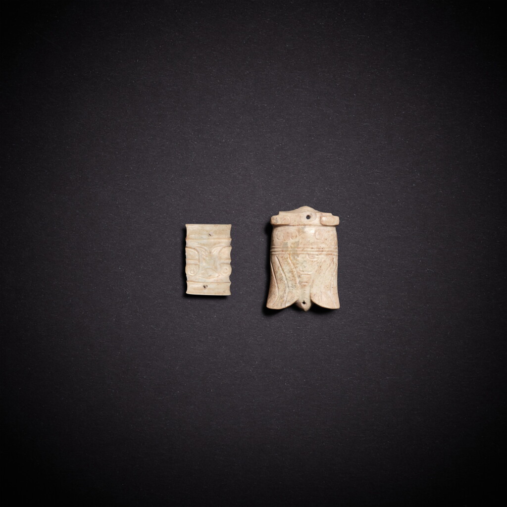 View full screen - View 1 of Lot 3500. A jade cicada and a 'mask' ornament, Western Zhou dynasty | 西周 玉蟬及玉人面飾.