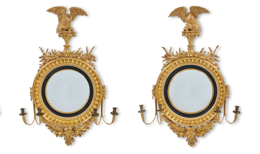 View full screen - View 1 of Lot 182. A Pair of Regency Giltwood and Ebonised Convex Girandole Mirrors, Circa 1810.