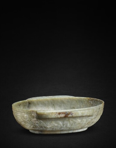 View full screen - View 1 of Lot 936. A jade 'dragon and phoenix' ear cup, Han dynasty | 漢 浮雕龍鳳螭紋玉羽觴盃.
