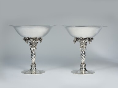 View full screen - View 1 of Lot 29. A Pair of Large Danish Silver Grapevine Tazze, No. 264B, Designed by Georg Jensen, George Jensen Silversmithy, Cophenhagen, 1925–1932.