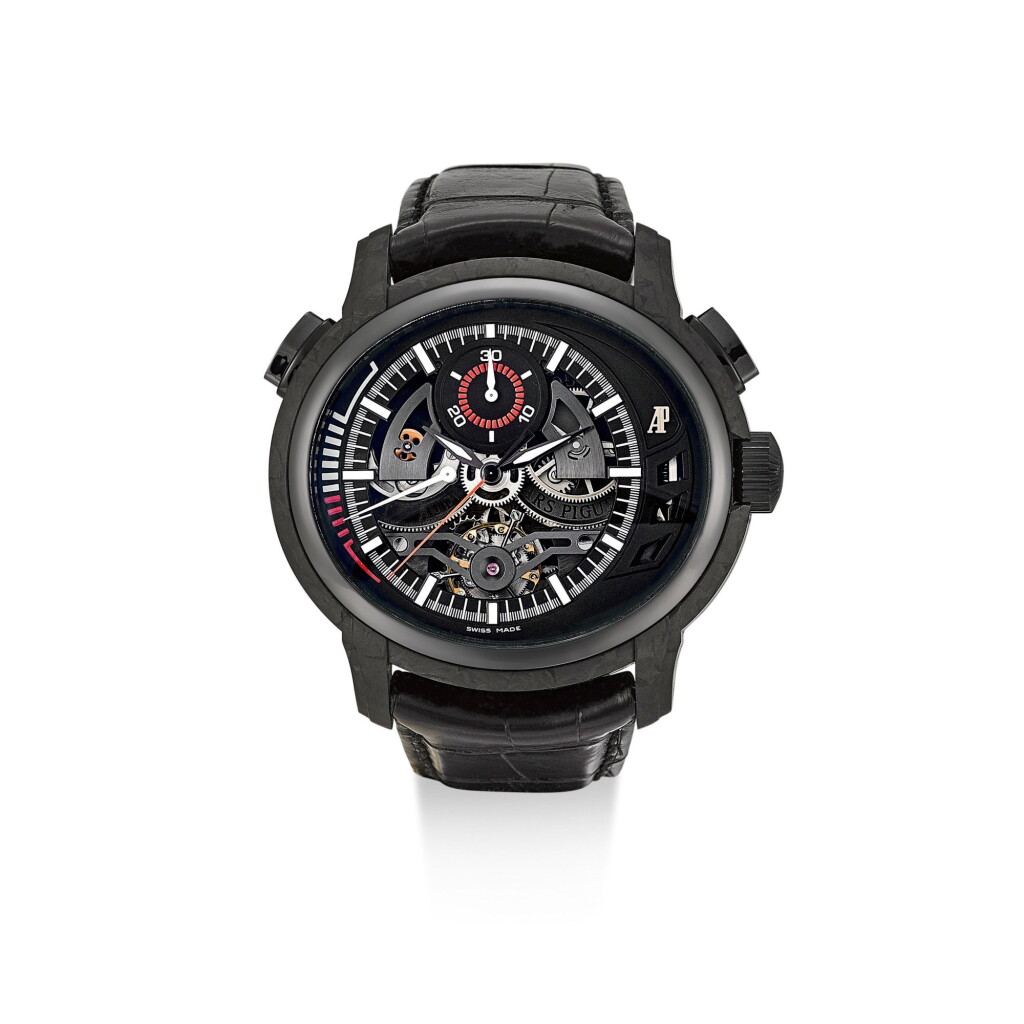 View full screen - View 1 of Lot 2170. AUDEMARS PIGUET | MILLENARY CARBON ONE, REFERENCE 26152.AU.00.D002CR.01, A LIMITED EDITION FORGED CARBON AND CERAMIC SEMI-SKELETONISED TOURBILLON CHRONOGRAPH WRISTWATCH WITH POWER RESERVE INDICATION, CIRCA 2010 | 愛彼 | "Millenary Carbon One 型號26152.AU.00.D002CR.01 限量版鍛碳及陶瓷半鏤空陀飛輪計時腕錶,備動力儲備顯示,機芯編號720991,錶殼編號G90673,約2010年製".