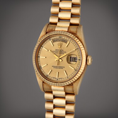 View full screen - View 1 of Lot 201. Reference 18238 Day-Date | A yellow gold automatic wristwatch with day, date, and bracelet, Circa 1991.