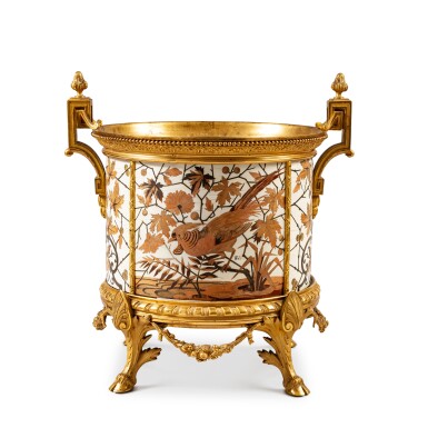 View full screen - View 1 of Lot 242. A gilt-bronze mounted ivory and wood marquetry jardiniere by Ferdinand Duvinage and Alphonse Giroux, late 19th century | Jardinière en marqueterie d'ivoire et de bois, monture de bronze doré, de la fin du XIXe siècle, par Ferdinand Duvinage et Alphonse Giroux.