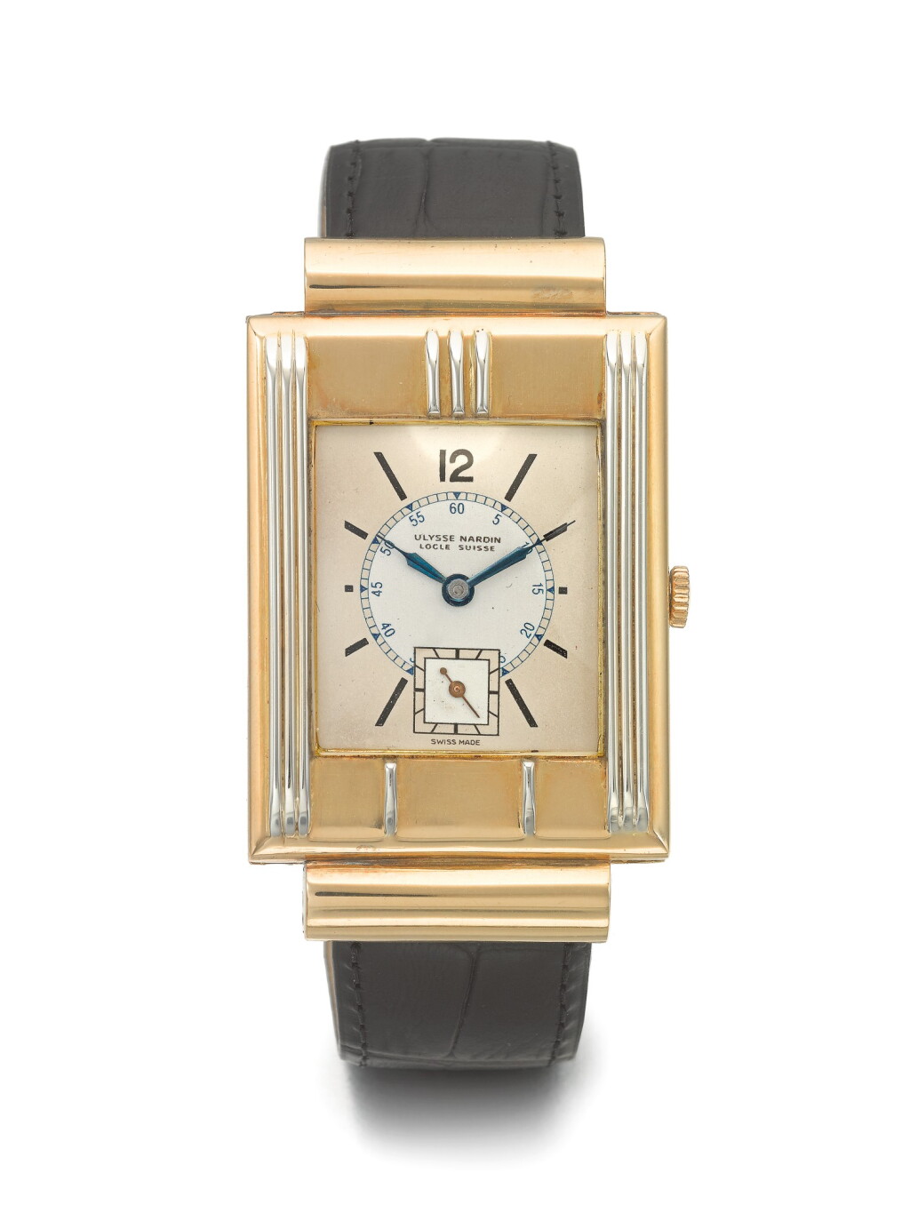 View full screen - View 1 of Lot 155. ULYSSE NARDIN | A LARGE YELLOW AND WHITE GOLD RECTANGULAR WRISTWATCH CIRCA 1939.