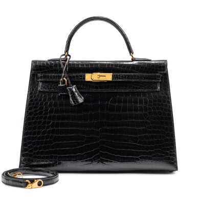 View full screen - View 1 of Lot 697. Vintage Black Shiny Porosus Crocodile Kelly 35 Sellier Gold Hardware, 1995.