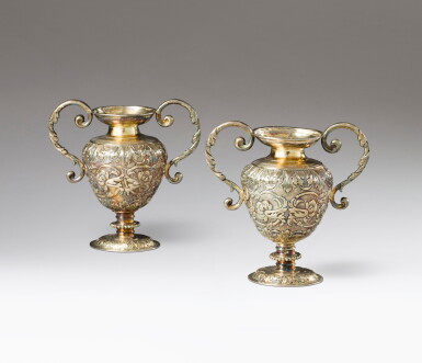 View full screen - View 1 of Lot 336. A pair of small silver-gilt altar vases, probably London circa 1660 | Paire de petits vases d'autel en vermeil, probablement Londres vers 1660.