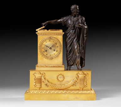 View full screen - View 1 of Lot 70. An Empire patinated and gilt-bronze mantel clock, early 19th century | Pendule à l'effigie de Napoléon en bronze patiné et doré d'époque Empire.