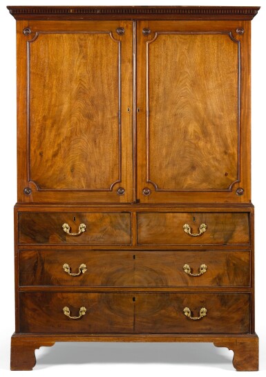 View full screen - View 1 of Lot 255. A George III mahogany press cupboard, circa 1770, attributed to William Crawford.