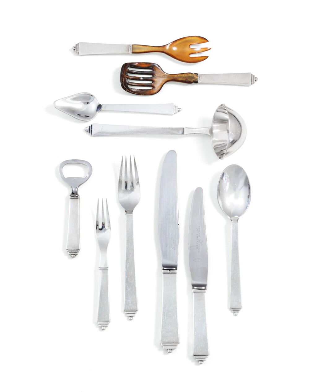 View full screen - View 1 of Lot 41. A Danish silver 263-piece flaware set, Pyramid pattern, Georg Jensen, Copenhagen, circa 1930 and later, some with English import marks | Ménagère en argent de 263 pièces, modèle Pyramide, par Georg Jensen, Copenhague, vers 1930 et après, certaines avec poinçons d'importation anglais de George Stockwell pour 1930.
